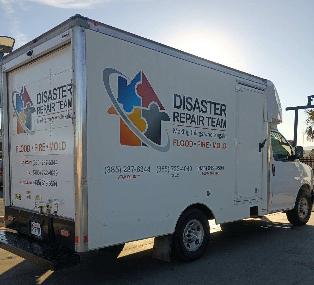 Disaster Repair Team response truck parked outside the office